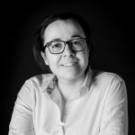 A black and white profile photo of Dr Georgina Brown