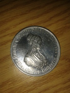 coin with woman