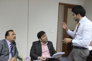 Nadeem (far right) delivering the session for SBP in Pakistan.