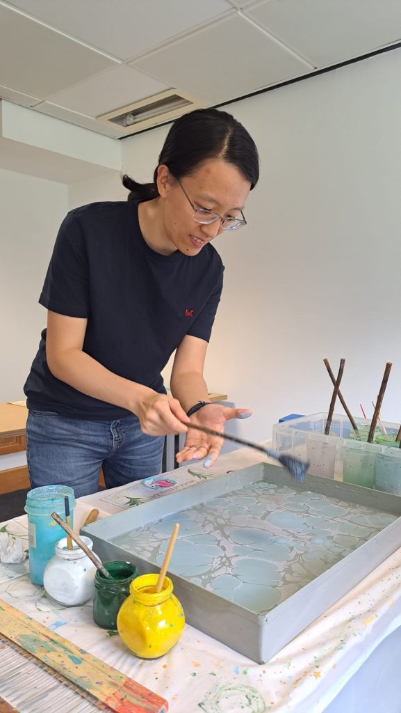 Participants trying Ebru art