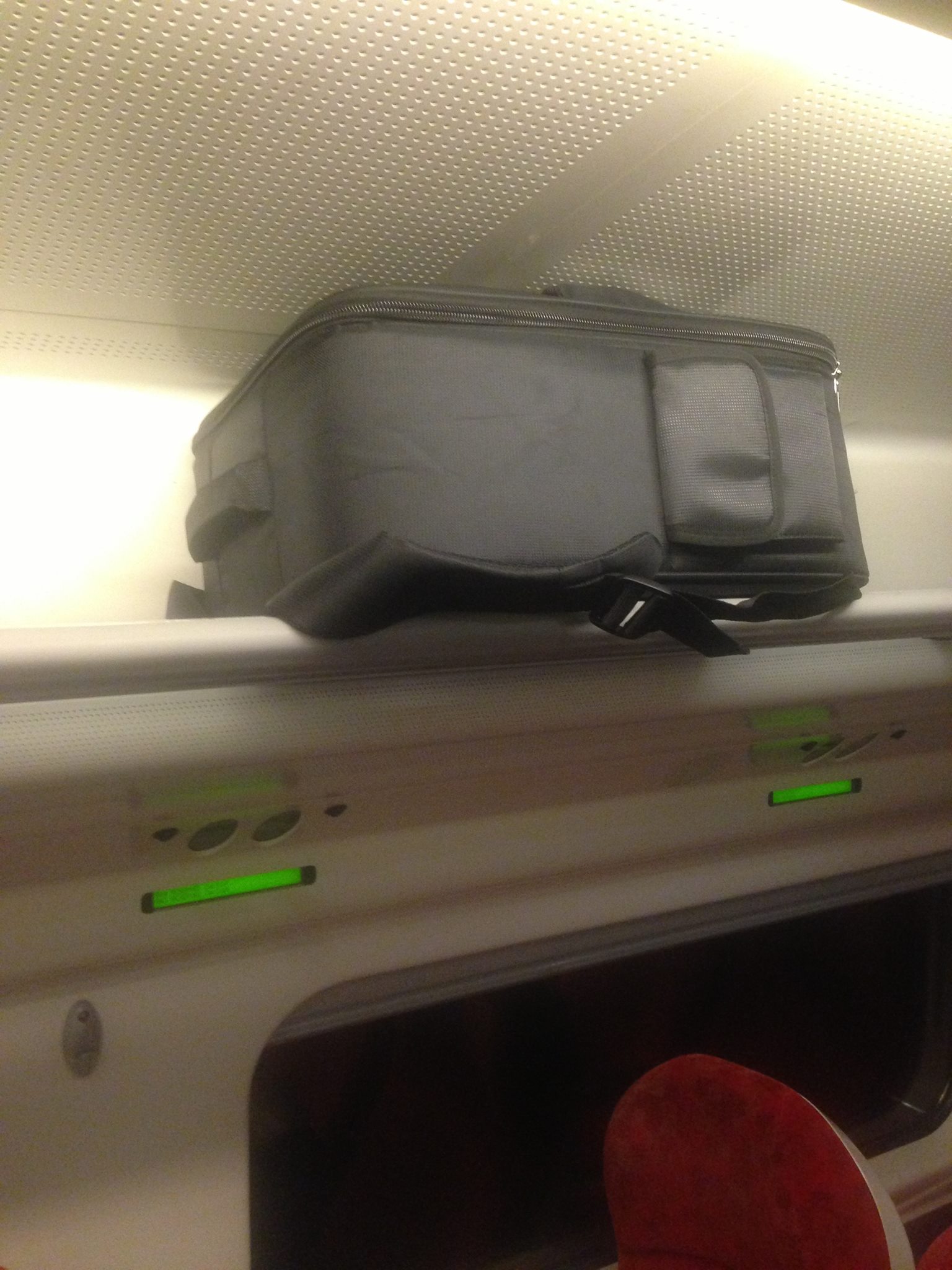 Drone in backpack on the train